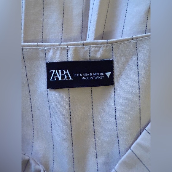 Zara Pleated Skort features a high waist, wrap front, side buckle, pleat details - Picture 10 of 16